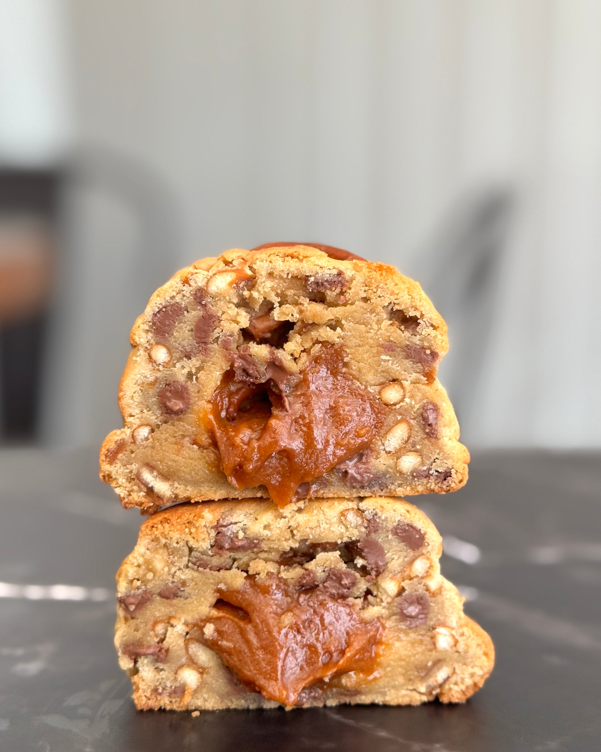 Salted caramel pretzel NYC cookie with molten caramel centre and Callebaut milk chocolate by Black Bird Bakers