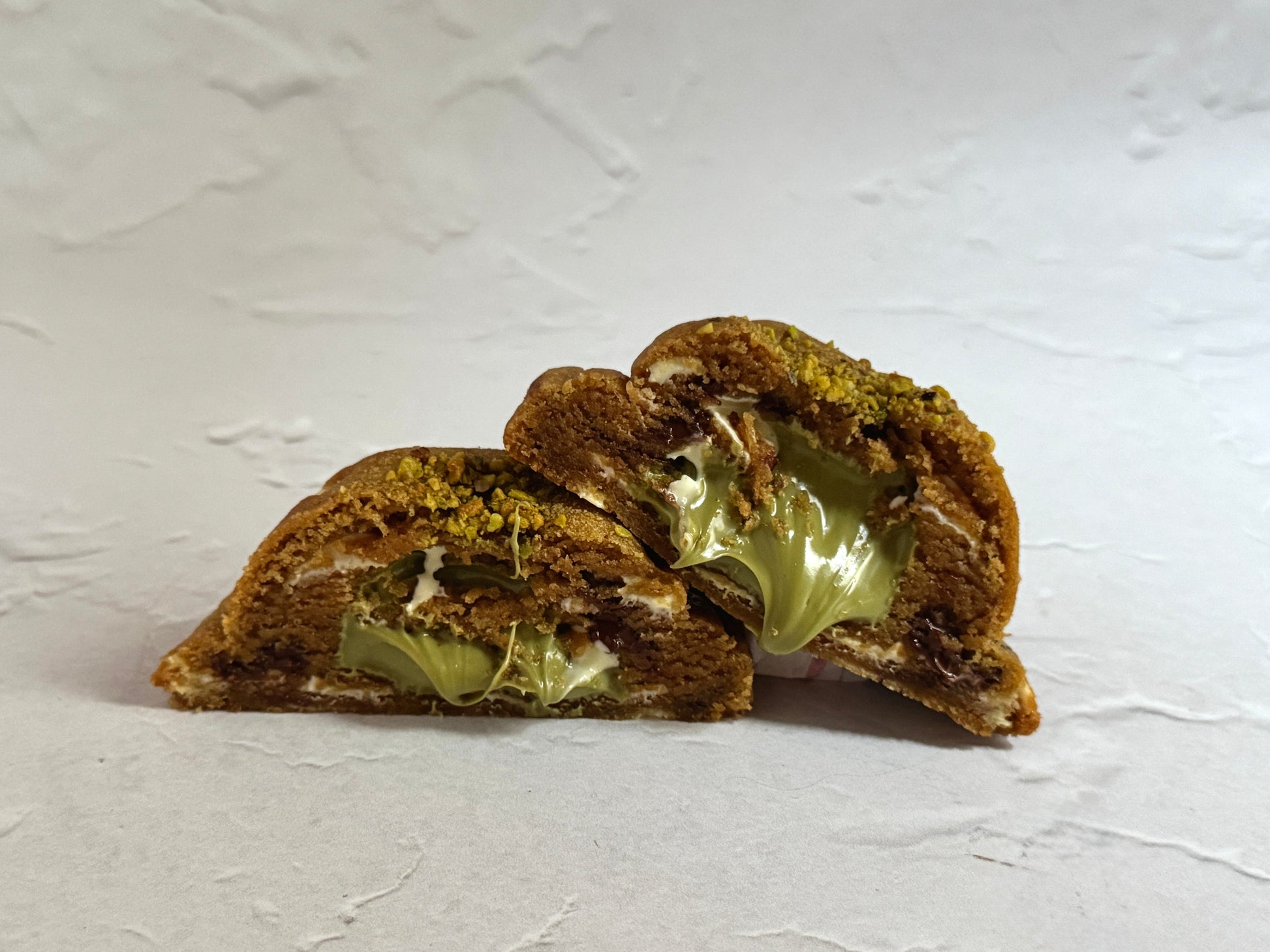 Pistachio Luxe luxury NYC cookie with pistachio cream centre and chopped pistachios.