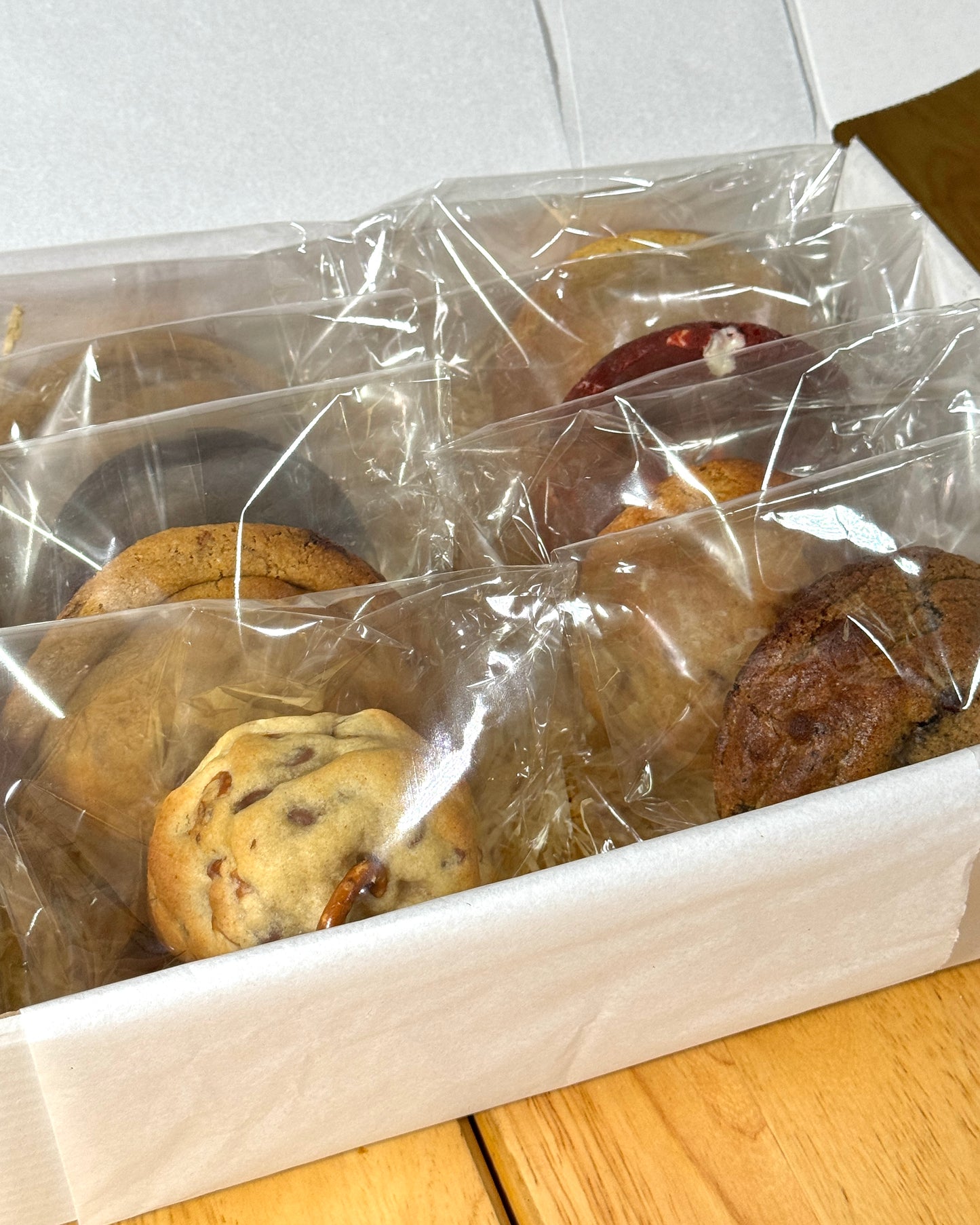 Assorted luxury stuffed cookies presented in a Black Bird Bakers gift box