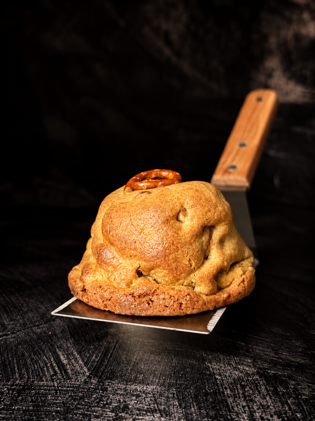 Thick handmade Caramel and Pretzel cookie topped with a pretzel, baked in Dartmoor by Black Bird Bakers