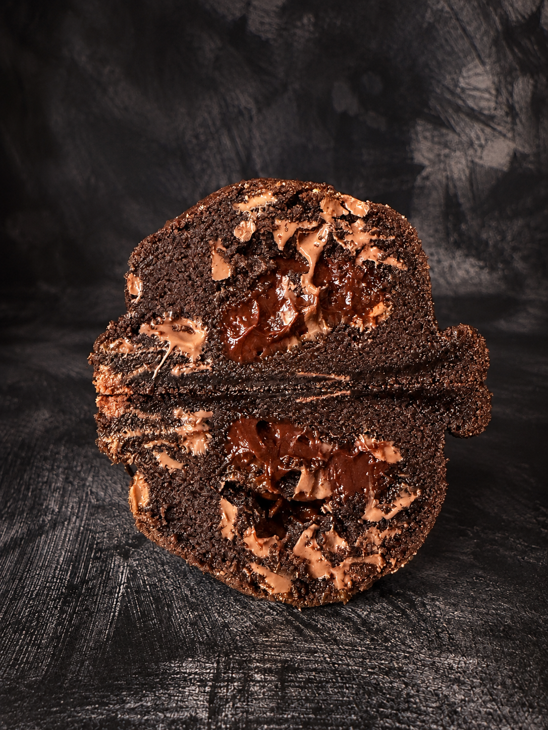 Midnight Noir deep-filled chocolate cookie with a rich dark Belgian chocolate ganache centre