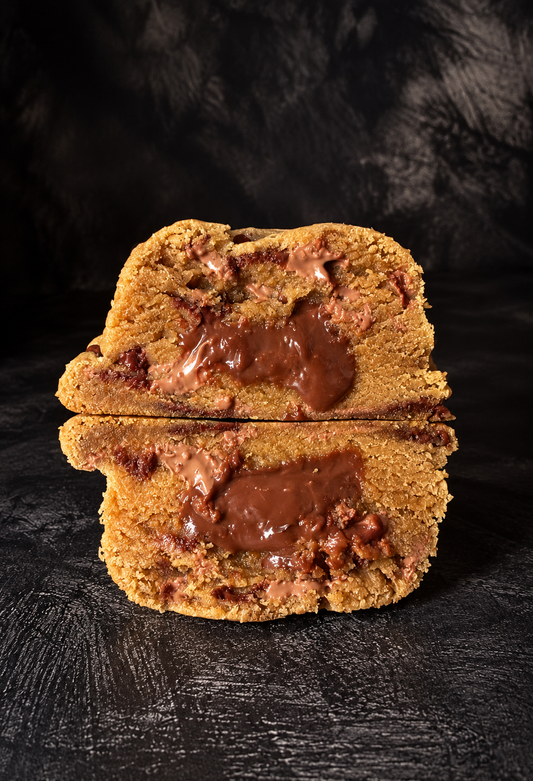 The Belgian chocolate chip cookie cut open with a gooey Belgian chocolate ganache centre